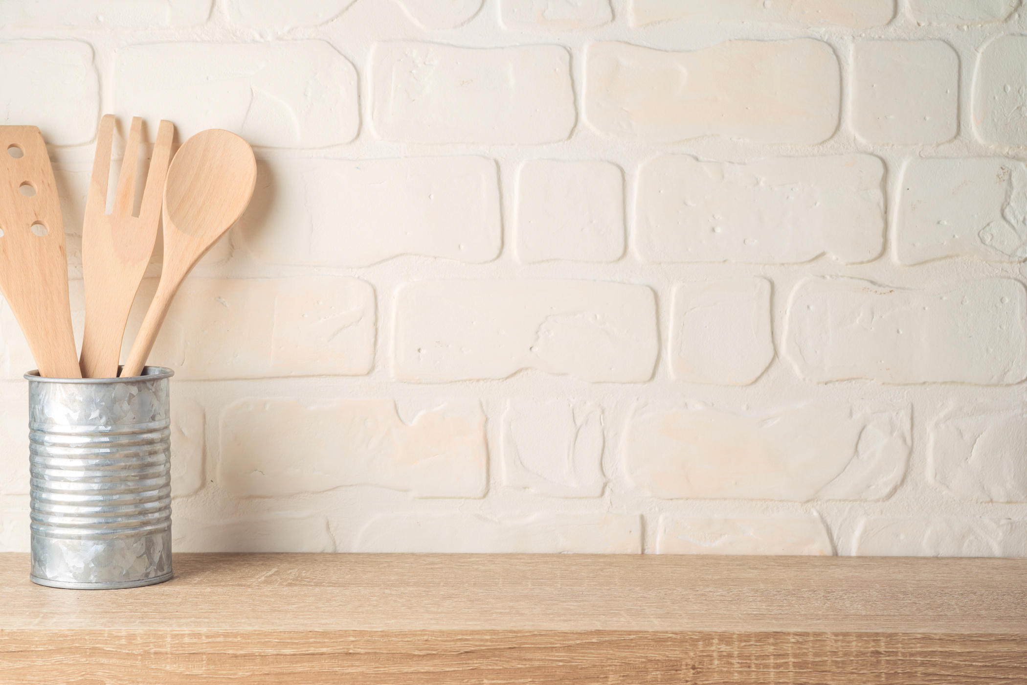 Kitchen background with kitchen utensils on wooden shelf